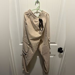 Tan pants from SHEIN , really cool, side pockets.